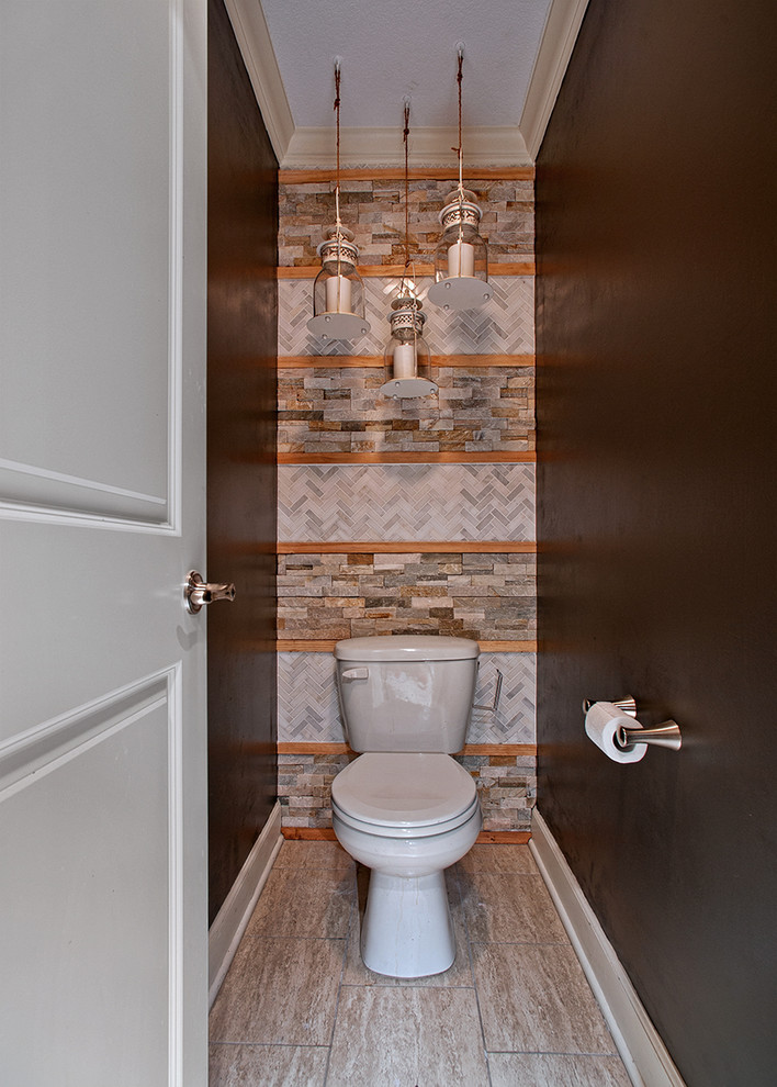 Inspiration for a small bohemian cloakroom in Kansas City with a two-piece toilet, marble tiles, brown walls, ceramic flooring and beige floors.