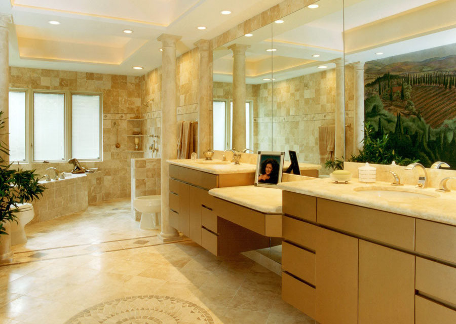 Huge minimalist beige tile travertine floor bathroom photo in Austin with an undermount sink, flat-panel cabinets, beige cabinets, quartz countertops, a two-piece toilet and beige walls