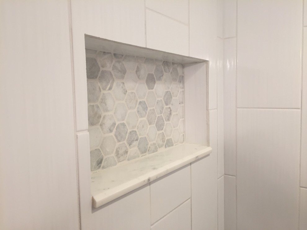 This is an example of a small modern shower room bathroom in Cleveland with a two-piece toilet, white tiles, ceramic tiles, grey walls, ceramic flooring, a submerged sink and granite worktops.