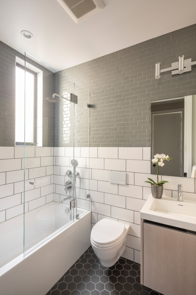 Mid-sized transitional kids' gray tile and ceramic tile ceramic tile, gray floor and single-sink bathroom photo in San Francisco with light wood cabinets, gray walls and white countertops