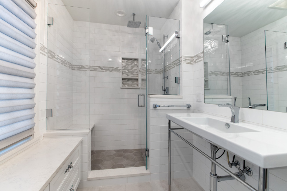 Small urban master white tile and subway tile porcelain tile and gray floor alcove shower photo in Cleveland with open cabinets, white cabinets, a two-piece toilet, white walls, an integrated sink, a hinged shower door and white countertops