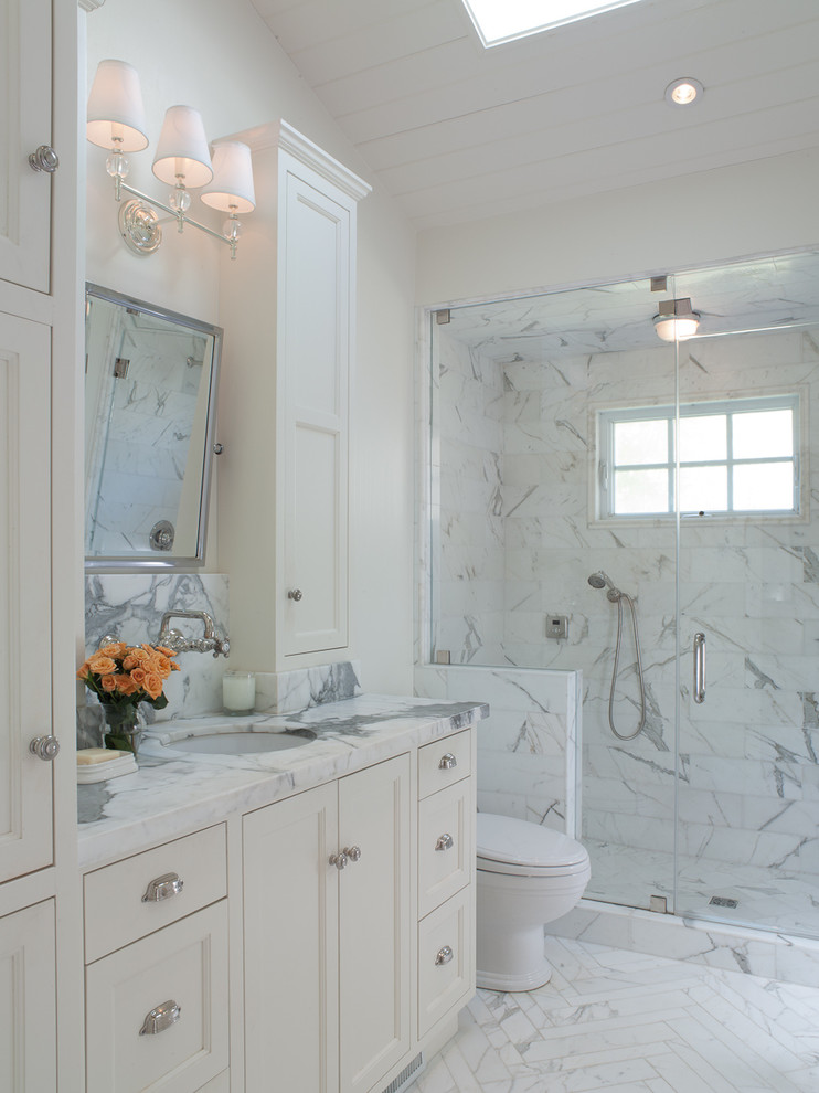 Bathroom - traditional bathroom idea in San Francisco with white cabinets, white walls and a hinged shower door
