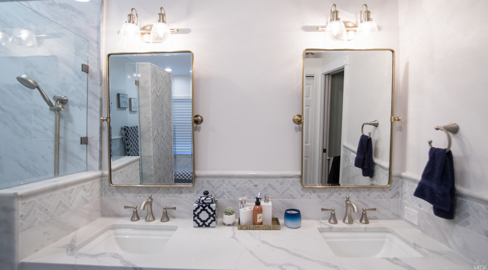 Inspiration for a medium sized contemporary ensuite bathroom in Tampa with recessed-panel cabinets, dark wood cabinets, a built-in shower, white tiles, marble tiles, a built-in sink, marble worktops, an open shower, white worktops, double sinks and a built in vanity unit.