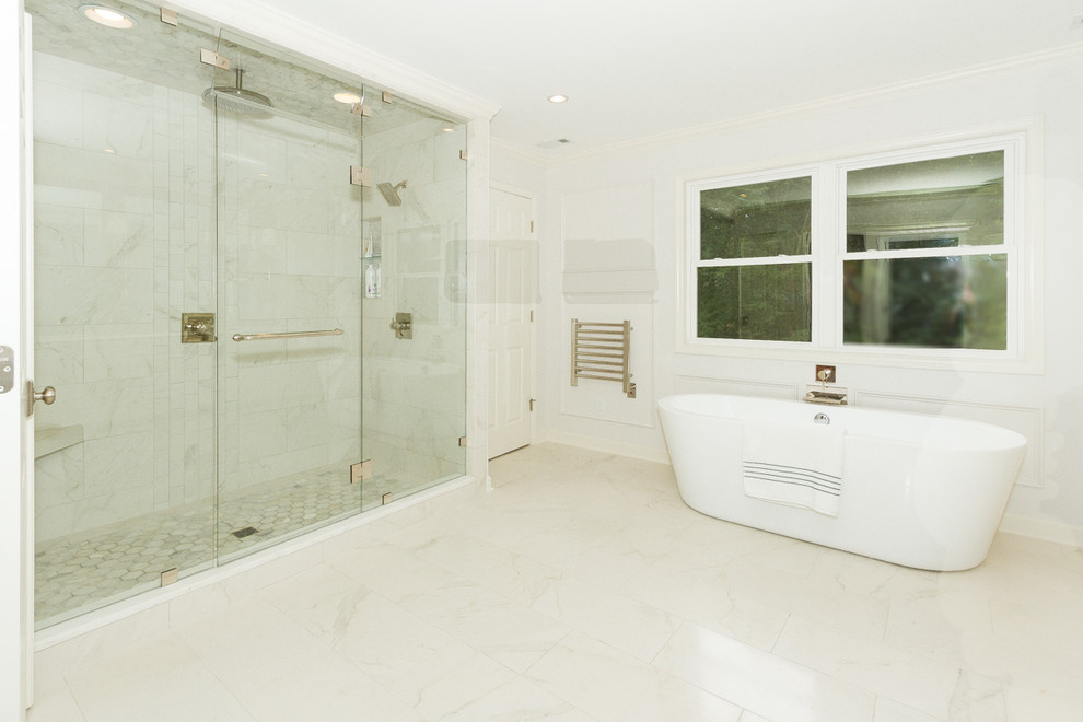 Inspiration for a traditional ensuite bathroom in Charlotte with a freestanding bath, a double shower and white walls.