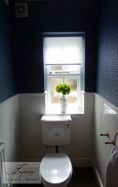 Inspiration for a contemporary powder room remodel in Essex