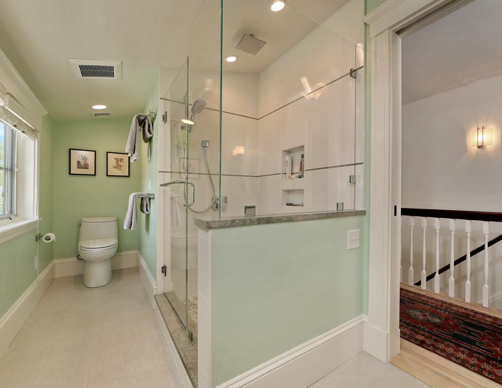 Example of a mid-sized transitional master white tile and porcelain tile porcelain tile and white floor doorless shower design in Boston with shaker cabinets, white cabinets, white walls, an undermount sink, granite countertops and a hinged shower door