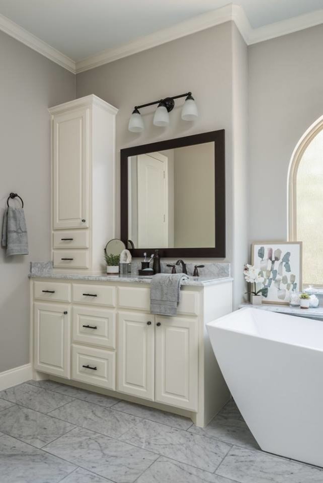 Expansive farmhouse ensuite bathroom in Dallas with raised-panel cabinets, white cabinets, a freestanding bath, an alcove shower, a one-piece toilet, multi-coloured tiles, marble tiles, grey walls, marble flooring, a vessel sink, marble worktops, multi-coloured floors, a hinged door and white worktops.