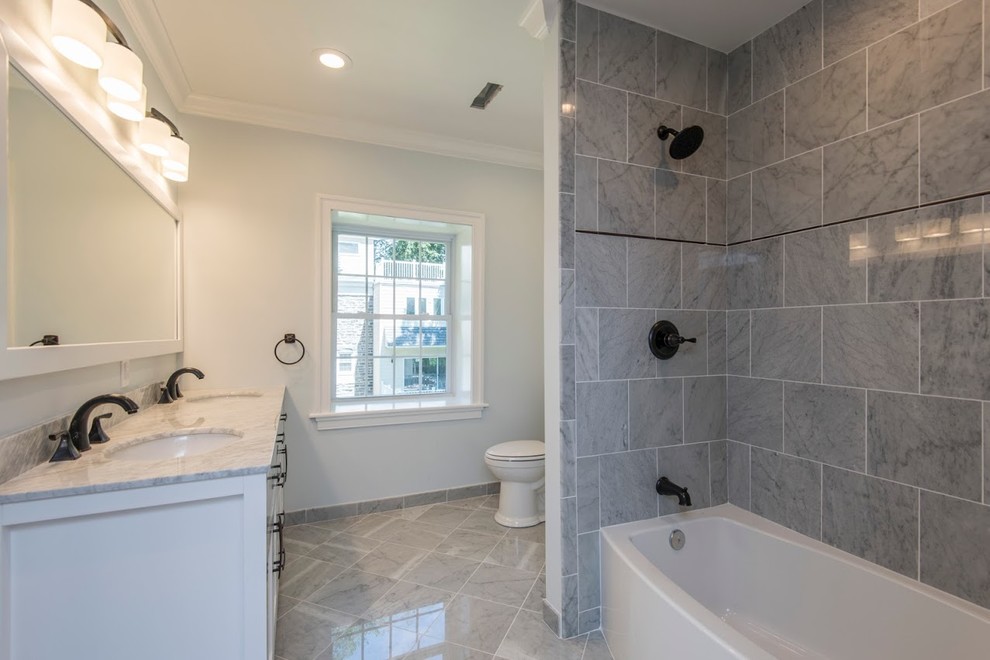 Photo of a small modern shower room bathroom in Philadelphia with shaker cabinets, white cabinets, a two-piece toilet, blue walls, dark hardwood flooring, a submerged sink and engineered stone worktops.