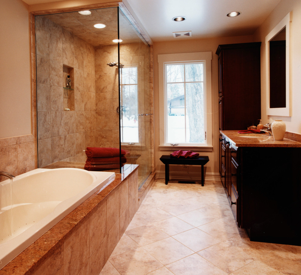 Example of a mid-sized classic master beige tile and ceramic tile ceramic tile bathroom design in Chicago with an integrated sink, flat-panel cabinets, dark wood cabinets, quartz countertops and beige walls