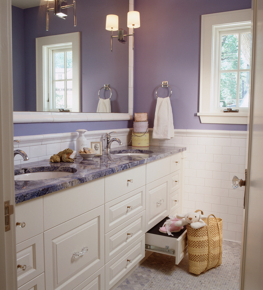 Bathroom - mid-sized traditional kids' white tile and subway tile mosaic tile floor bathroom idea in Minneapolis with white cabinets, purple walls, an undermount sink, beaded inset cabinets, granite countertops and a two-piece toilet