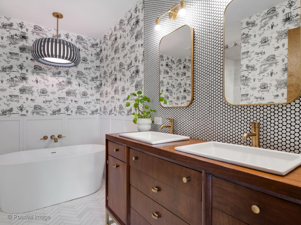 Large midcentury ensuite bathroom in Chicago with a freestanding bath, an alcove shower, black and white tiles, porcelain tiles, marble flooring, wooden worktops, white floors, a wall niche, double sinks, a built in vanity unit, a wood ceiling and wainscoting.