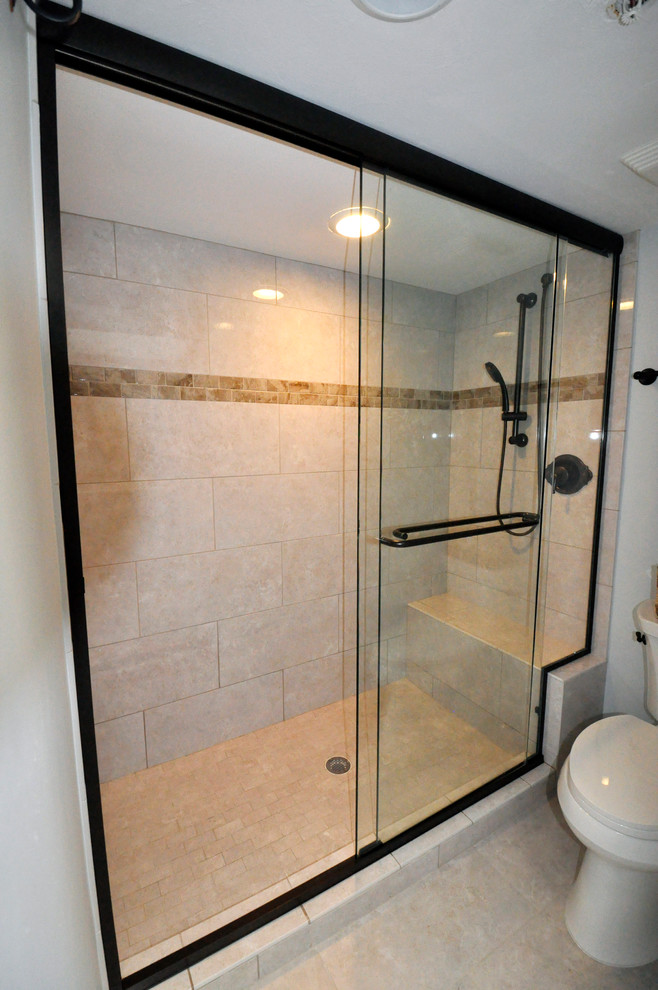 Example of a small classic 3/4 beige tile and porcelain tile ceramic tile alcove shower design in Miami with a one-piece toilet