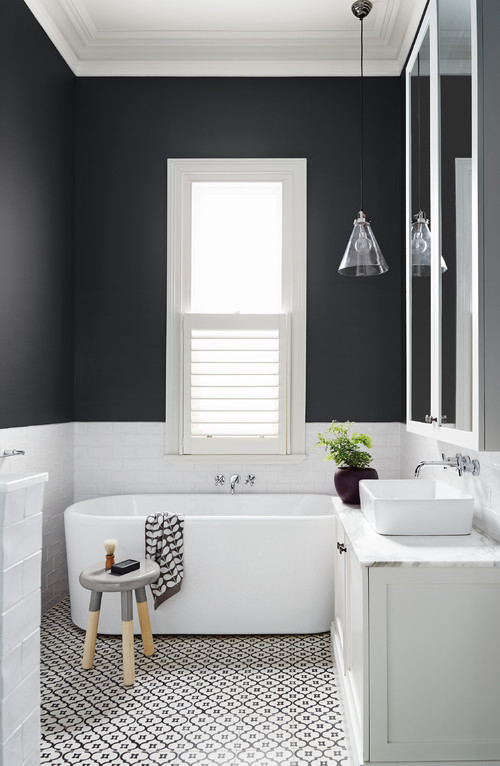 Black and White Bathroom with Geometric Floor Tiles