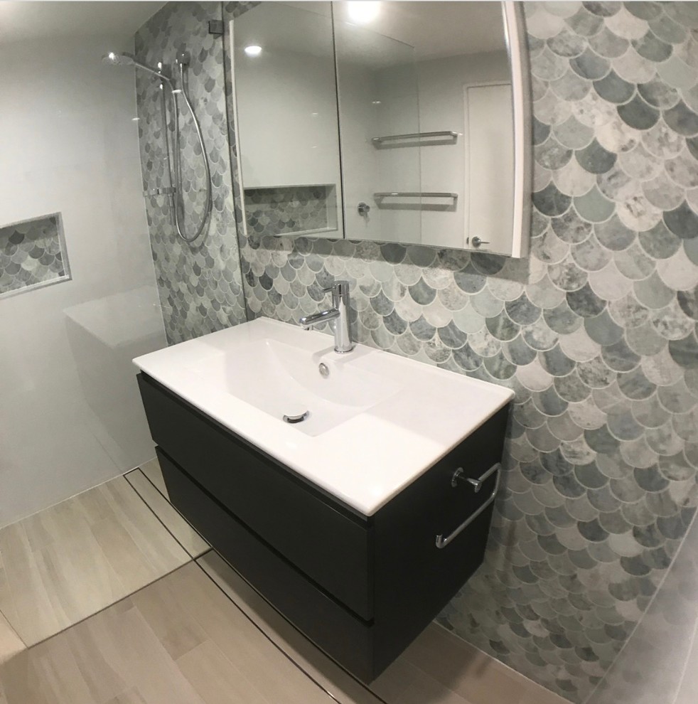 Inspiration for a small contemporary green tile and marble tile porcelain tile and beige floor bathroom remodel in Sydney with a bidet and quartz countertops