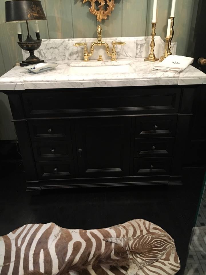 Inspiration for a bathroom in Other with freestanding cabinets, black cabinets, a freestanding bath, a corner shower, black and white tiles, grey walls, dark hardwood flooring, a submerged sink and marble worktops.