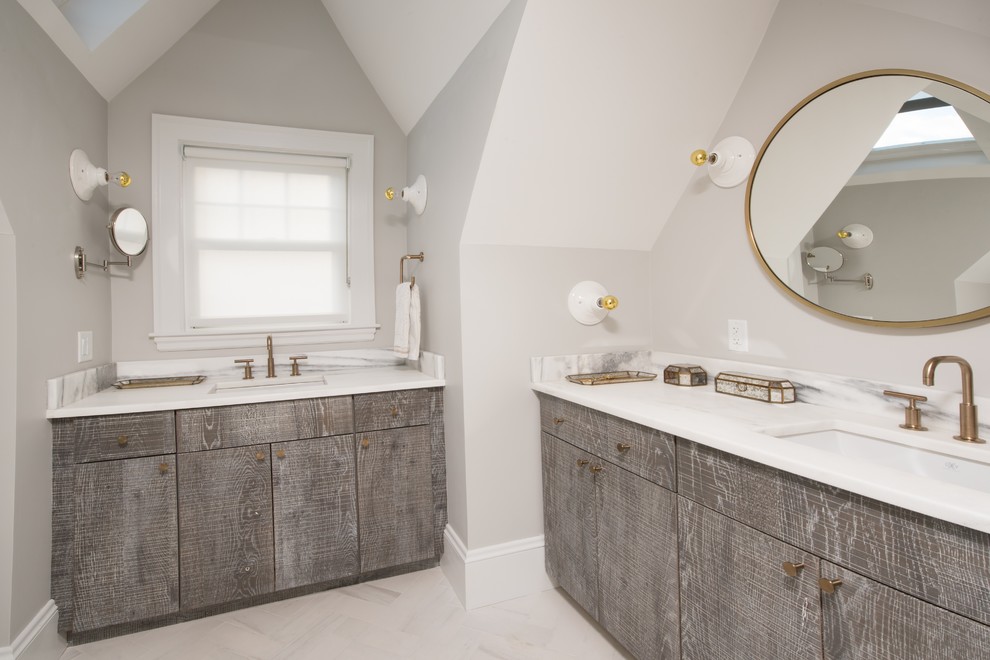 Photo of a large traditional ensuite bathroom in Boston with flat-panel cabinets, distressed cabinets, grey walls, a submerged sink, engineered stone worktops, a one-piece toilet, white tiles, marble tiles, marble flooring and white floors.