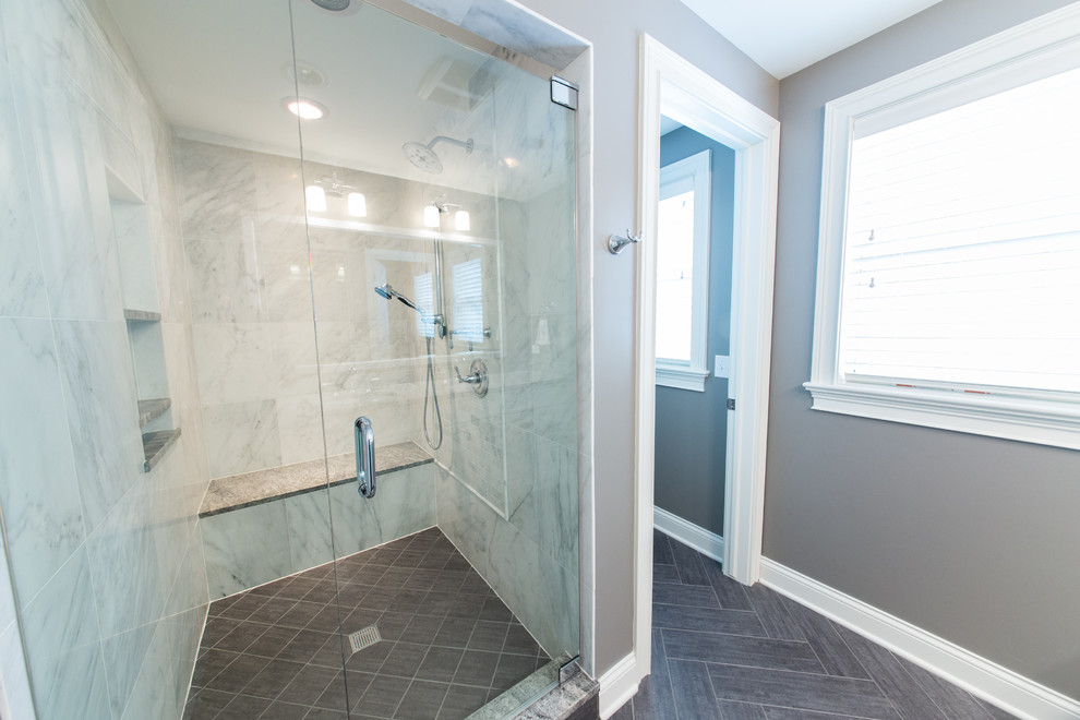 Large traditional ensuite bathroom in Chicago with raised-panel cabinets, white cabinets, marble worktops, an alcove shower, grey tiles, metro tiles and white walls.