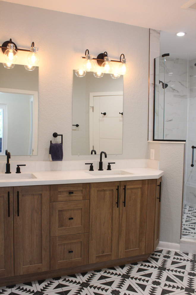 Mid-sized mid-century modern master white floor and double-sink double shower photo in Orlando with shaker cabinets, medium tone wood cabinets, gray walls, quartz countertops, a hinged shower door, white countertops and a built-in vanity