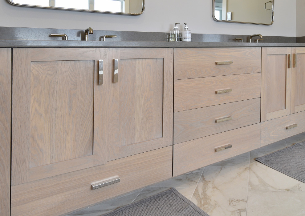 Beach style double-sink bathroom photo in Bridgeport with shaker cabinets, light wood cabinets and a floating vanity