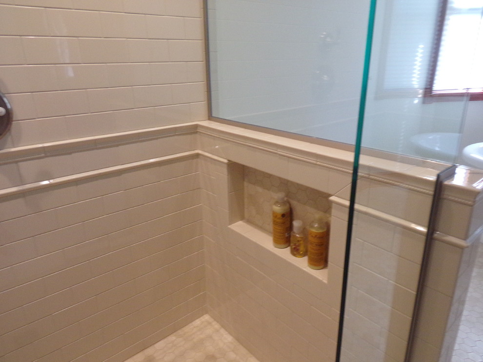 Photo of a large victorian ensuite bathroom in Other with medium wood cabinets, a freestanding bath, a walk-in shower, white tiles, ceramic tiles, white walls, marble flooring, a submerged sink and granite worktops.