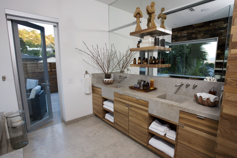 Inspiration for a medium sized modern ensuite bathroom in Los Angeles with freestanding cabinets, medium wood cabinets, limestone worktops, grey tiles, stone slabs and limestone flooring.