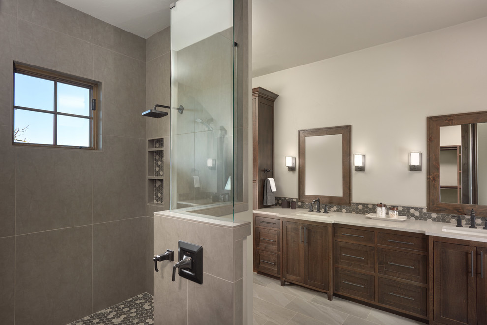 Medium sized traditional ensuite bathroom in Portland with shaker cabinets, dark wood cabinets, a walk-in shower, a one-piece toilet, grey tiles, grey walls, a submerged sink, grey floors and an open shower.