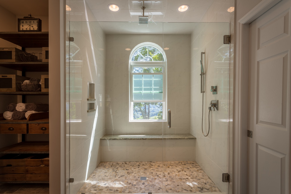Example of a mid-sized cottage chic 3/4 gray tile and ceramic tile ceramic tile alcove shower design in Charlotte with an undermount sink, white cabinets, granite countertops, a two-piece toilet and gray walls