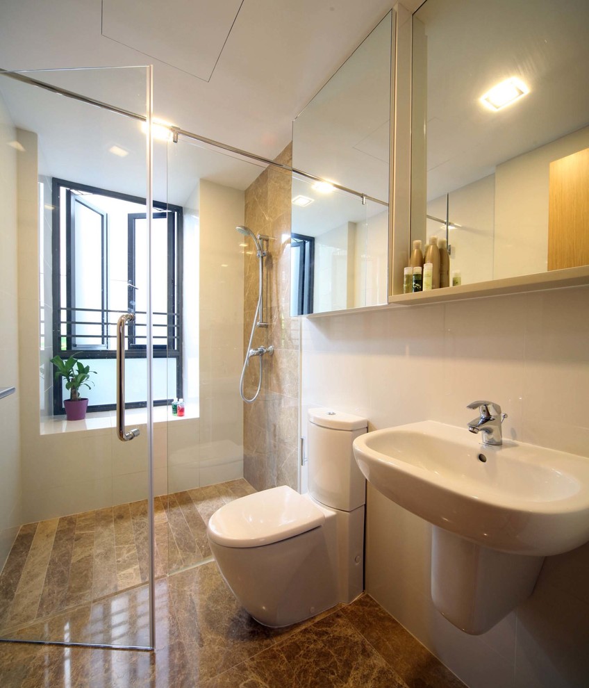 Contemporary bathroom in Singapore with an alcove shower, a two-piece toilet, white walls and a wall-mounted sink.