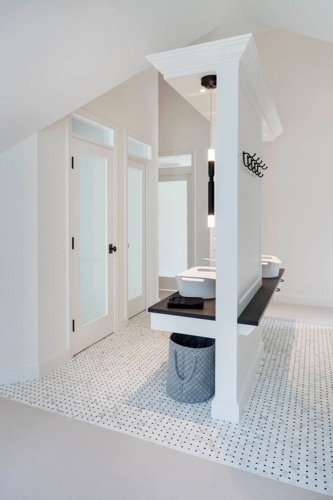 Mid-sized minimalist kids' black and white tile and ceramic tile porcelain tile bathroom photo in Boston with recessed-panel cabinets, white cabinets, beige walls, a trough sink and granite countertops