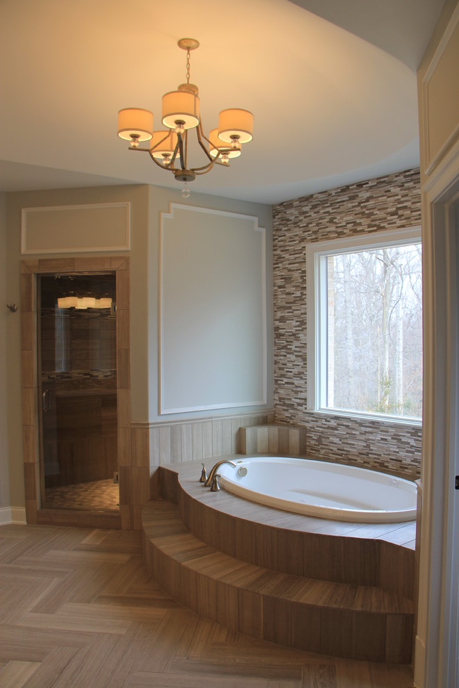 Источник вдохновения для домашнего уюта: большая главная ванная комната в стиле неоклассика (современная классика) с столешницей из плитки, накладной ванной, угловым душем, зеленой плиткой, каменной плиткой и серыми стенами