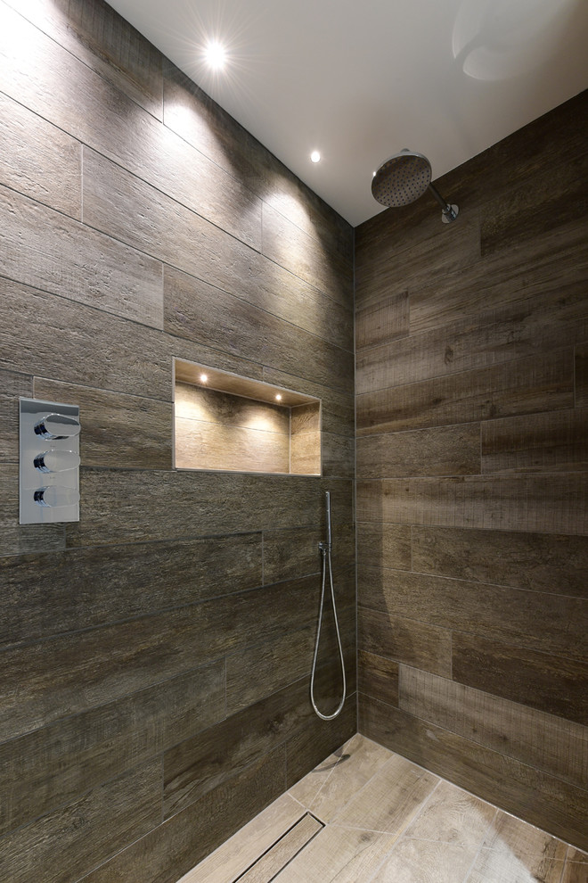 Contemporary bathroom in Oxfordshire with brown tiles, porcelain tiles, porcelain flooring and brown floors.