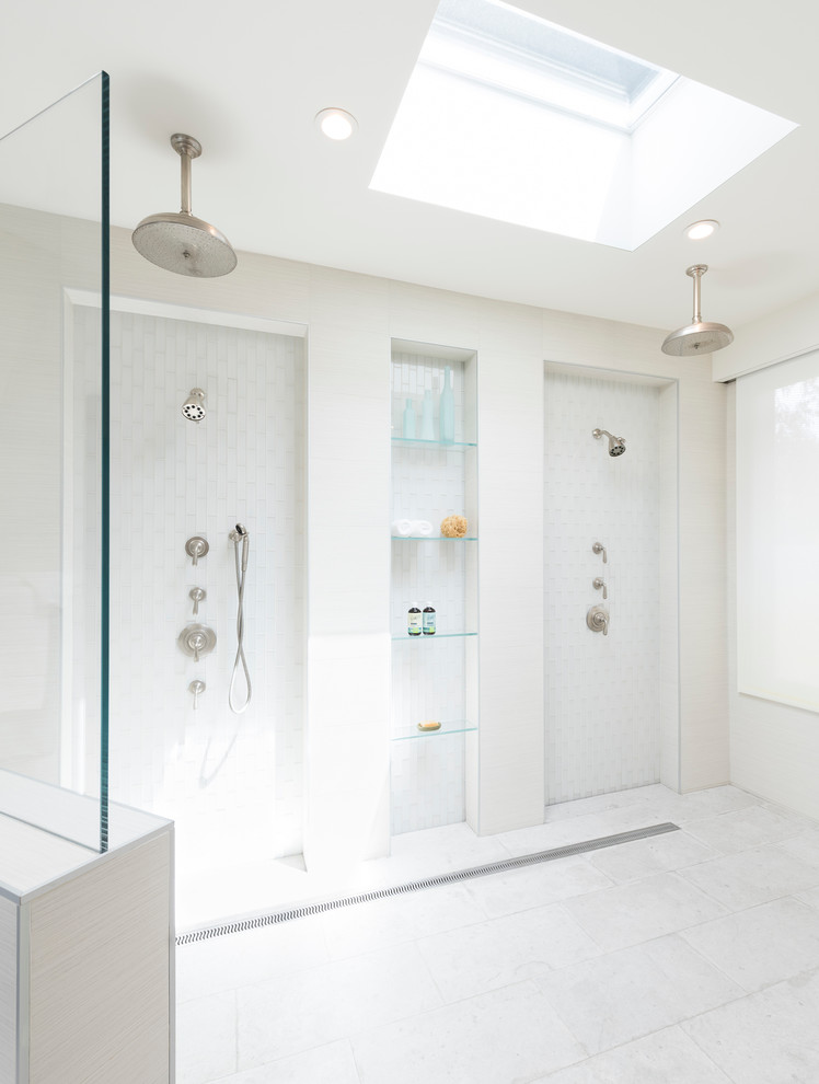 Design ideas for an expansive modern ensuite wet room bathroom in San Diego with flat-panel cabinets, medium wood cabinets, a freestanding bath, a two-piece toilet, white tiles, glass tiles, white walls, marble flooring, a submerged sink, quartz worktops, white floors and an open shower.