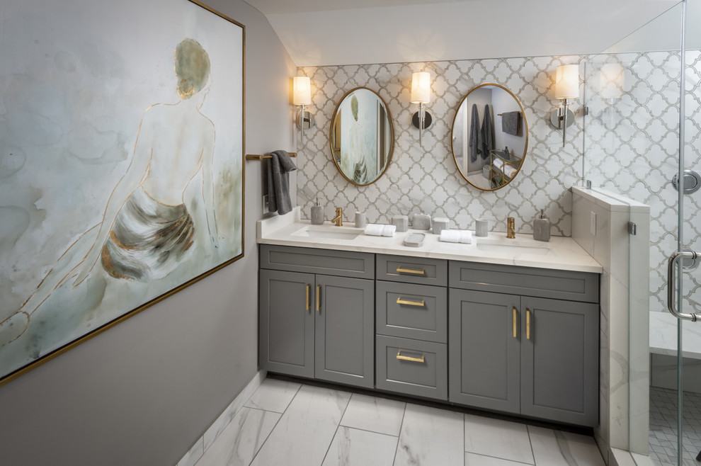 Design ideas for a medium sized classic ensuite bathroom in Philadelphia with shaker cabinets, grey cabinets, a double shower, a wall mounted toilet, white tiles, porcelain tiles, grey walls, porcelain flooring, a built-in sink, quartz worktops, white floors, a hinged door, white worktops, a shower bench, double sinks, a built in vanity unit and wallpapered walls.