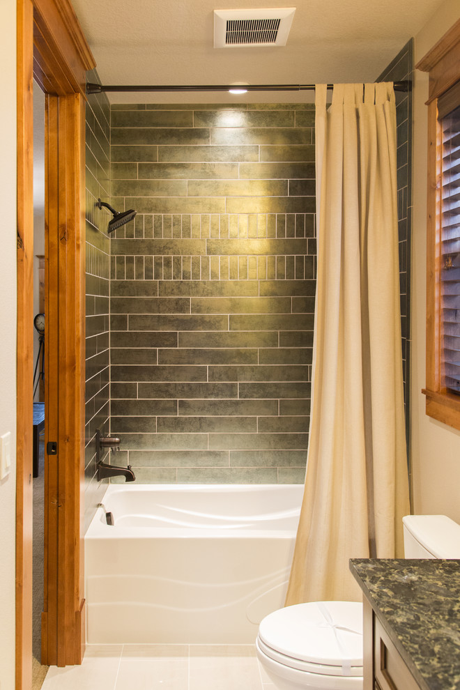 Inspiration for a small timeless kids' green tile and porcelain tile porcelain tile bathroom remodel in Portland with an undermount sink, recessed-panel cabinets, medium tone wood cabinets, granite countertops, a two-piece toilet and beige walls