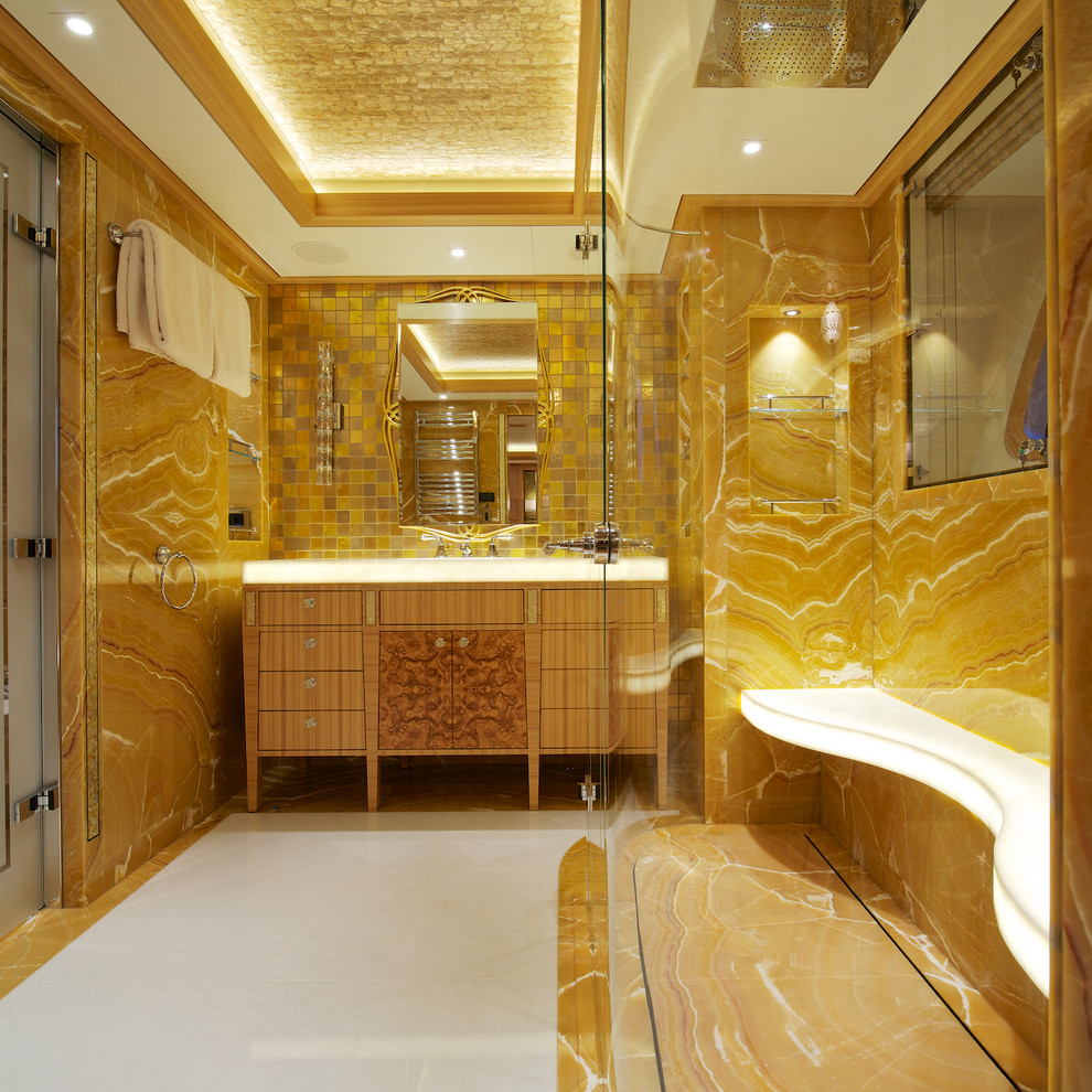 Inspiration for a traditional bathroom in Miami with flat-panel cabinets, light wood cabinets and a built-in shower.