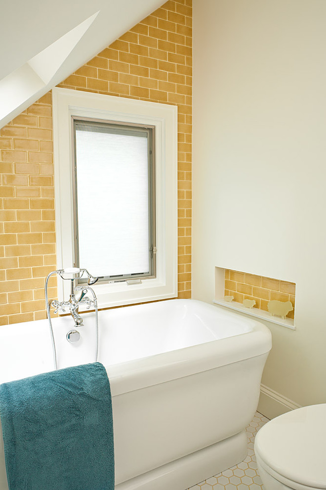 This is an example of a beach style bathroom in Atlanta with yellow tiles.