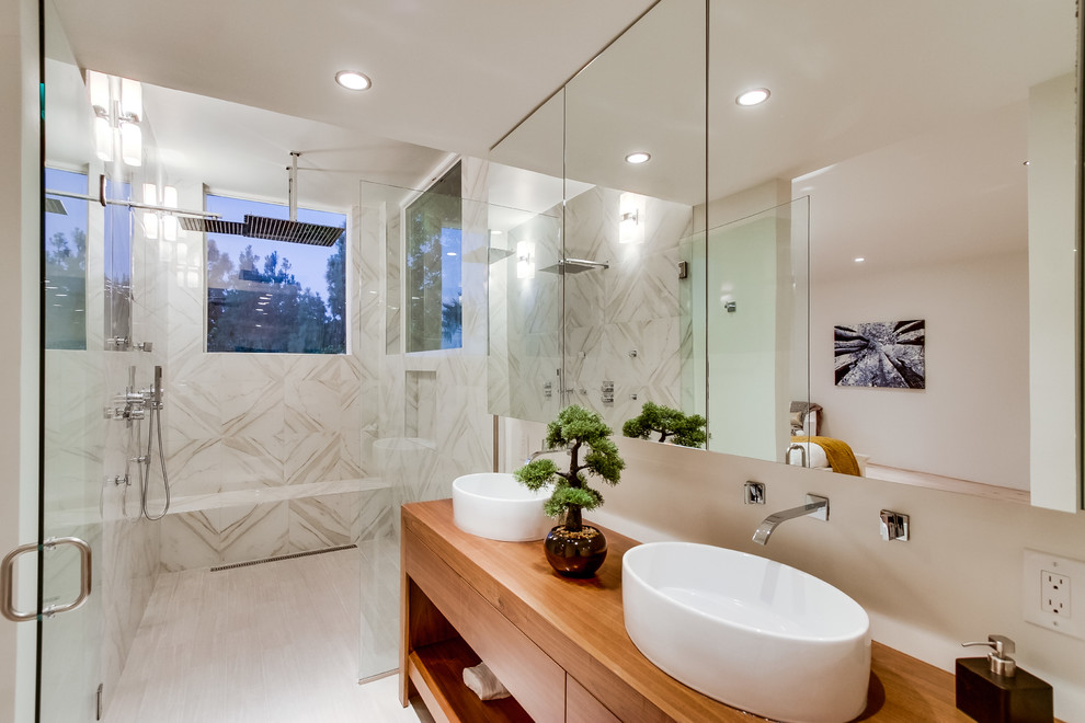 Example of a trendy walk-in shower design in San Diego with a vessel sink and wood countertops