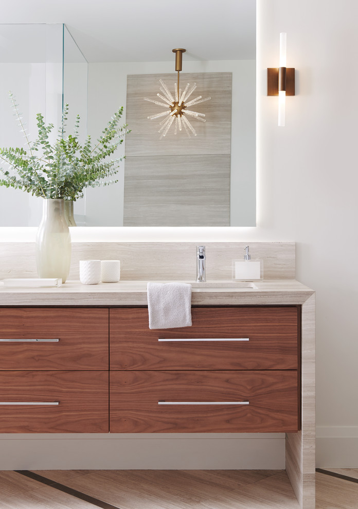 Esempio di una stanza da bagno moderna con ante lisce, ante in legno scuro, pareti bianche, lavabo da incasso, pavimento beige e top beige