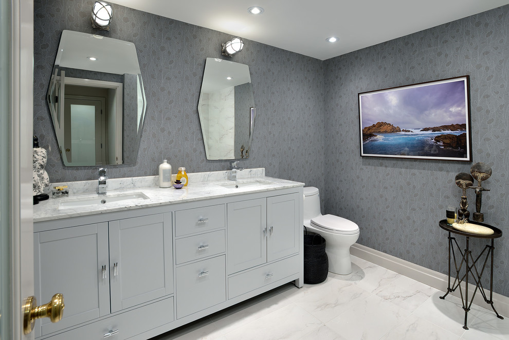 This is an example of a medium sized traditional shower room bathroom in Toronto with shaker cabinets, grey cabinets, an alcove bath, an alcove shower, a one-piece toilet, white tiles, stone tiles, grey walls, ceramic flooring, a submerged sink and marble worktops.