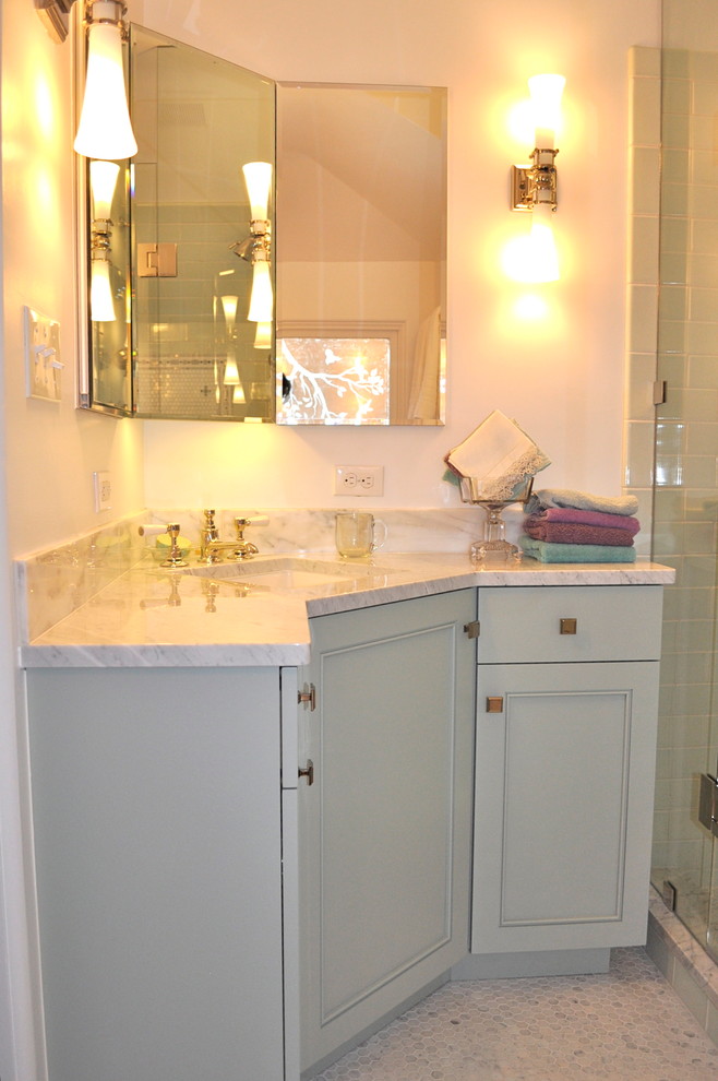 Corner shower - small traditional master blue tile, gray tile, green tile, white tile and subway tile porcelain tile corner shower idea in Denver with beaded inset cabinets, blue cabinets, white walls, an undermount sink and marble countertops