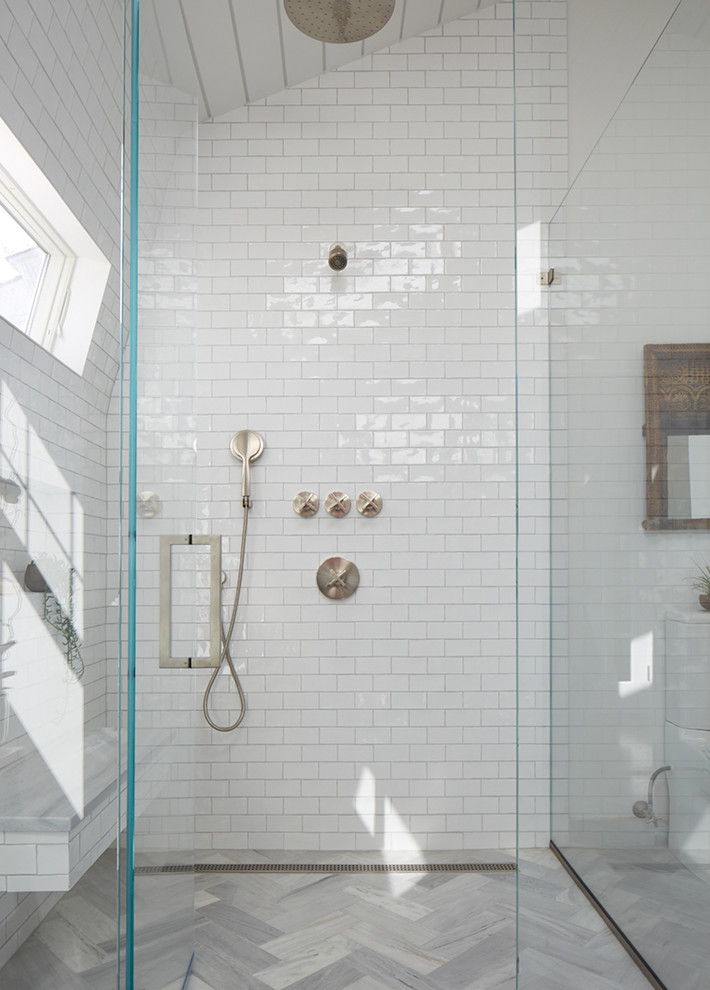 Walk-in shower - large modern master white tile and subway tile marble floor and gray floor walk-in shower idea in New York with a two-piece toilet, white walls, a pedestal sink, flat-panel cabinets and gray cabinets