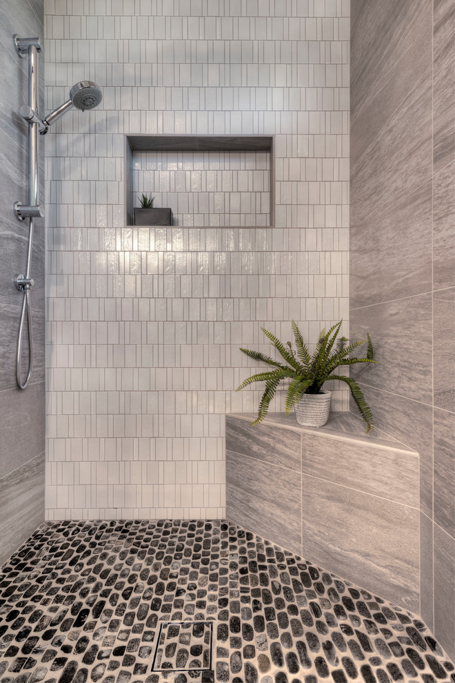 Bathroom - mid-sized zen master green tile and ceramic tile ceramic tile and gray floor bathroom idea in San Francisco with recessed-panel cabinets, medium tone wood cabinets, a two-piece toilet, green walls, an undermount sink, quartz countertops and gray countertops