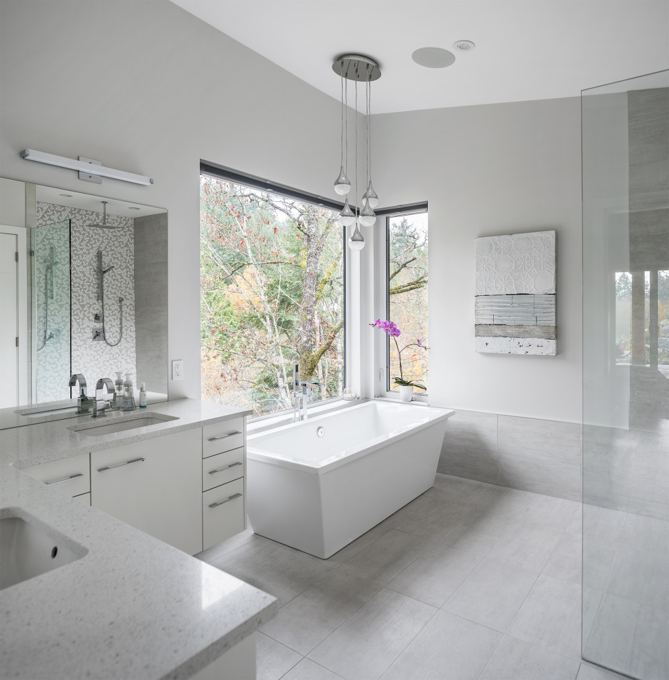 Inspiration for a contemporary master gray tile gray floor bathroom remodel in Vancouver with flat-panel cabinets, white cabinets, gray walls, an undermount sink and gray countertops