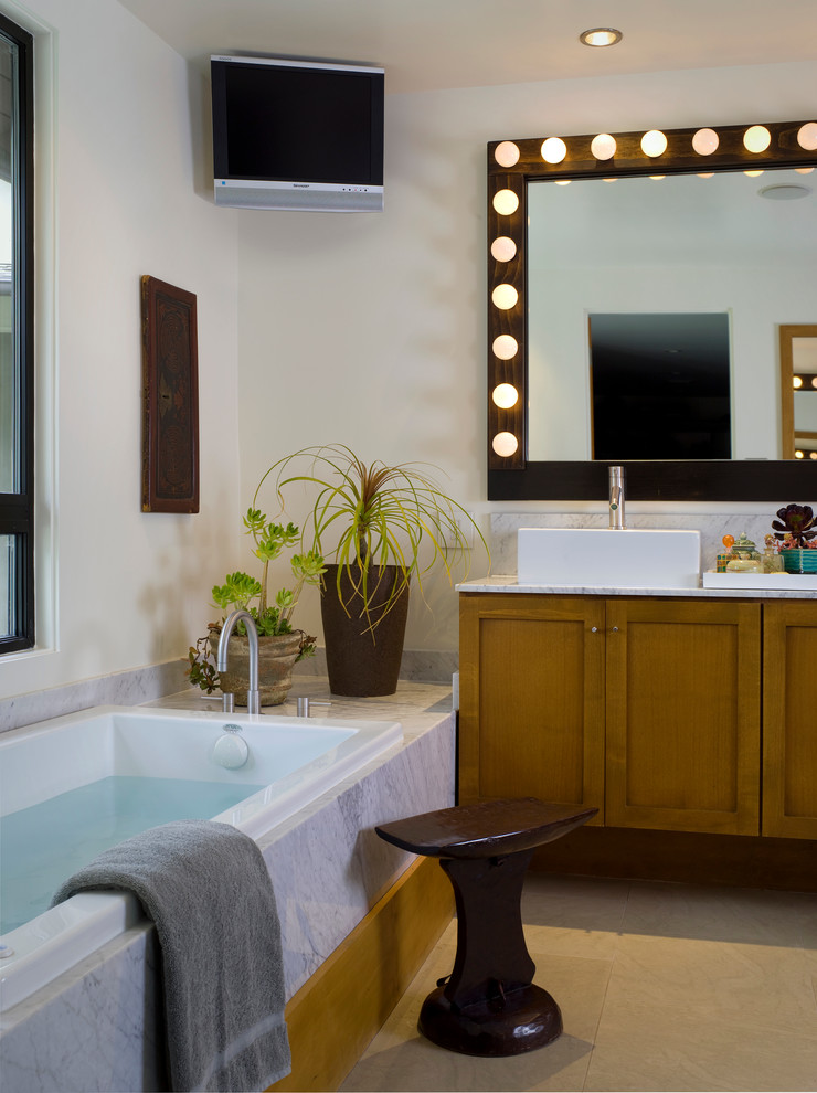 Inspiration for a contemporary bathroom remodel in Santa Barbara with a vessel sink