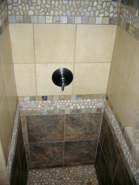 This is an example of a medium sized world-inspired ensuite bathroom in Portland with an alcove shower.