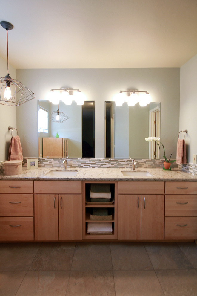 Example of a mid-sized asian master beige tile and glass tile bathroom design in Phoenix with open cabinets, light wood cabinets, an undermount sink and quartz countertops