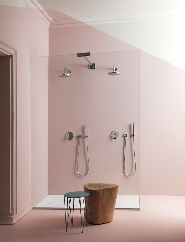 Contemporary bathroom in London with pink walls.