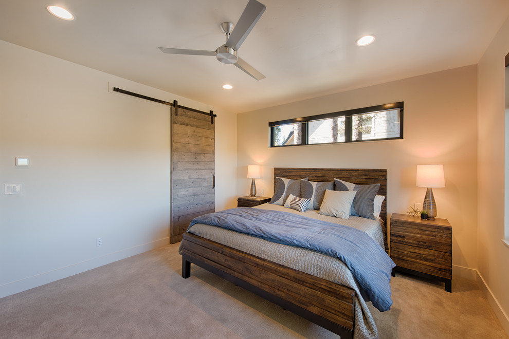 Imagen de habitación de invitados actual de tamaño medio con paredes grises, moqueta y suelo gris