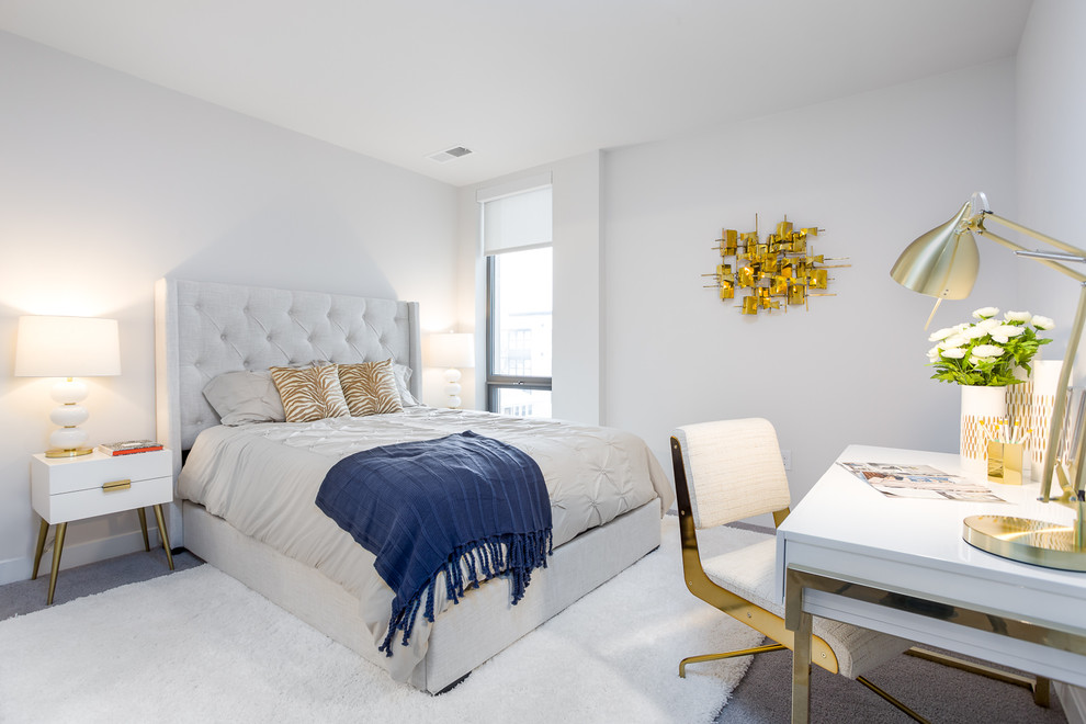 Ejemplo de habitación de invitados actual con paredes blancas, moqueta y suelo gris