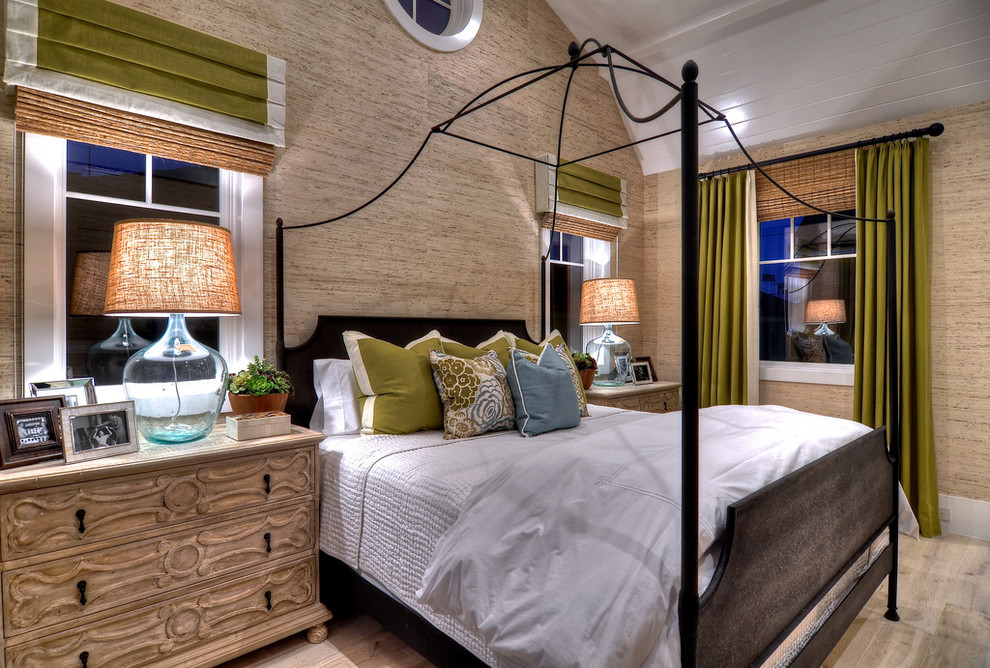 Inspiration for a timeless light wood floor bedroom remodel in Orange County with beige walls